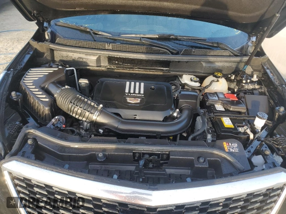 2022 Cadillac XT5 FWD Luxury z VIN 1GYKNAR49NZ159814, wystawiony jako Copart lot #74506584 z przebiegiem 7 069 mil mil oraz Nie do naprawy • Non repairable. Historia ofert i sprzedaży dostępna na DreamBid. Obrazek 12.