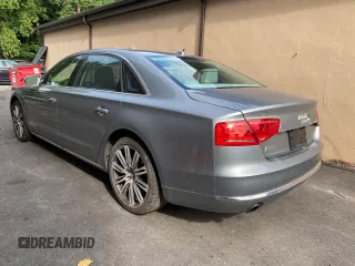 2011 Audi A8 with VIN WAURVAFD7BN018734, listed as a Copart auction lot 63735055 with 79,694 mi miles and Clean title. Bid and sale history available at DreamBid. Image 3.