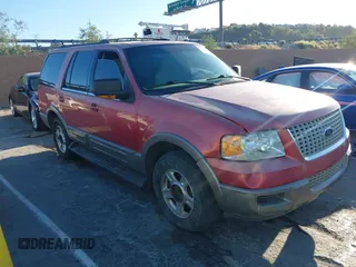 2003 Ford Expedition Eddie Bauer with VIN 1FMFU17L13LA71890, listed as a IAAI auction lot 42843579 with Not provided miles and . Bid and sale history available at DreamBid. Image 1.