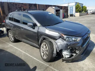 2021 Toyota RAV4 XLE Premium with VIN 2T3C1RFV3MC136191, listed as a Copart auction lot 61188995 with 53,524 mi miles and Salvage title. Bid and sale history available at DreamBid. Image 4.