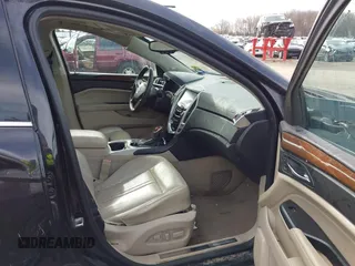 2013 Cadillac SRX Luxury Collection z VIN 3GYFNCE35DS607553, wystawiony jako IAAI lot #42151522 z przebiegiem 104 688 mil mil oraz . Historia ofert i sprzedaży dostępna na DreamBid. Obrazek 5.