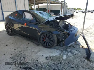 2022 Tesla Model Y Performance z VIN 7SAYGDEF2NF448013, wystawiony jako Copart lot #52323435 z przebiegiem Nie podano mil oraz Nie do naprawy. Historia ofert i sprzedaży dostępna na DreamBid. Obrazek 4.