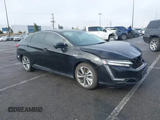 2019 Honda Clarity Plug-In Hybrid Touring with VIN JHMZC5F31KC001168, listed as a IAAI auction lot 41653549 with 181,976 mi miles. Bid and sale history available at carsss.com. Image 1.