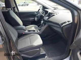 2016 Ford Escape SE with VIN 1FMCU9GX8GUB42944, listed as a IAAI auction lot 42171770 with 120,041 mi miles. Bid and sale history available at carsss.com. Image 5.