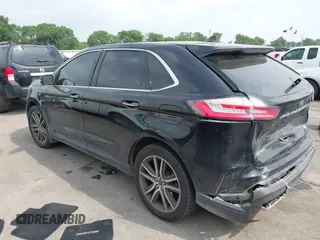 2020 Ford Edge Titanium z VIN 2FMPK3K92LBB24713, wystawiony jako IAAI lot #41949412 z przebiegiem 97 014 mil mil oraz . Historia ofert i sprzedaży dostępna na DreamBid. Obrazek 3.