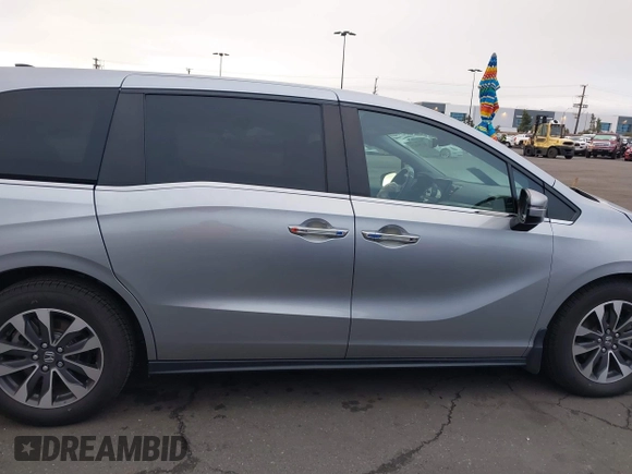 2022 Honda Odyssey EX-L with VIN 5FNRL6H77NB041754, listed as a IAAI auction lot 41791425 with 15,306 mi miles and . Bid and sale history available at DreamBid. Image 14.