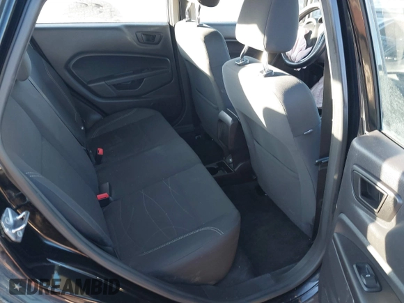 2017 Ford Fiesta SE z VIN 3FADP4BJ6HM125903, wystawiony jako IAAI lot #41376018 z przebiegiem 114 628 mil mil oraz . Historia ofert i sprzedaży dostępna na DreamBid. Obrazek 8.