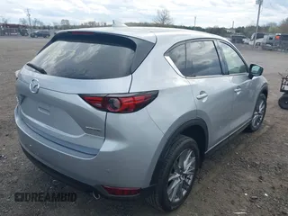 2021 Mazda CX-5 Grand Touring with VIN JM3KFBDM3M0354348, listed as a IAAI auction lot 41924207 with 45,786 mi miles. Bid and sale history available at carsss.com. Image 4.