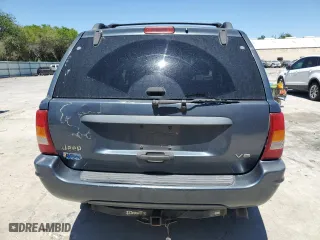 2004 Jeep Grand Cherokee Laredo with VIN 1J4GX48N54C371073, listed as a Copart auction lot 52202855 with 212,368 mi miles and Salvage Title. Bid and sale history available at carsss.com. Image 6.