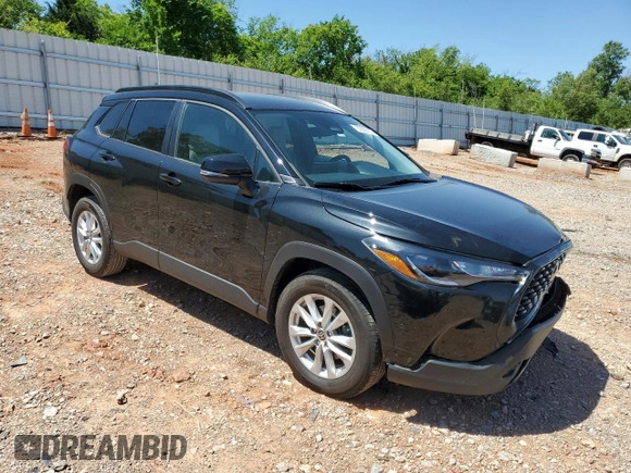 2023 Toyota Corolla Cross LE with VIN 7MUCAAAG3PV058094, listed as a Copart auction lot 57983105 with 30,593 mi miles and Salvage title. Bid and sale history available at DreamBid. Image 4.