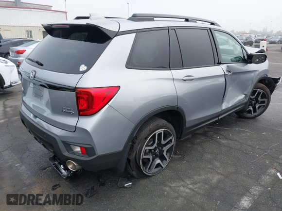 2023 Honda Passport Elite with VIN 5FNYF8H02PB029127, listed as a IAAI auction lot 41166484 with 16,200 mi miles and . Bid and sale history available at DreamBid. Image 4.