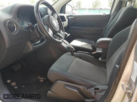 2011 Jeep Compass Latitude with VIN 1J4NF1FB6BD263831, listed as a Copart auction lot 52542625 with 160,743 mi miles and Salvage Title. Bid and sale history available at DreamBid. Image 7.