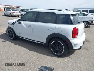 2016 MINI Countryman S with VIN WMWZC5C57GWU22015, listed as a IAAI auction lot 41806547 with 65,124 mi miles and . Bid and sale history available at DreamBid. Image 3.