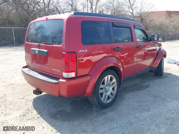 2011 Dodge Nitro Heat with VIN 1D4PU4GXXBW517547, listed as a IAAI auction lot 41785509 with 233,240 mi miles. Bid and sale history available at carsss.com. Image 4.