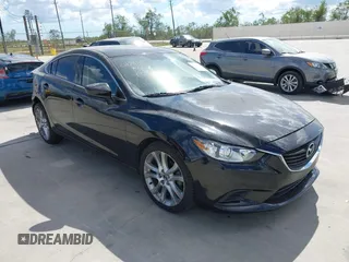 2016 Mazda Mazda6 i Touring with VIN JM1GJ1V53G1430339, listed as a IAAI auction lot 40696335 with 88,433 mi miles. Bid and sale history available at carsss.com. Image 1.