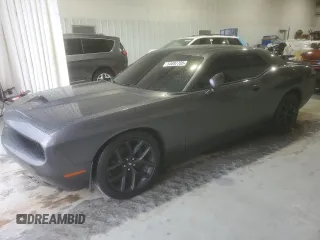 2021 Dodge Challenger GT z VIN 2C3CDZJG2MH665196, wystawiony jako Copart lot #54697705 z przebiegiem 74 120 mil mil oraz Szkoda całkowita • Salvage title. Historia ofert i sprzedaży dostępna na DreamBid. Obrazek 1.
