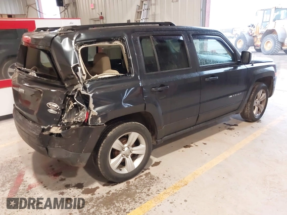 2014 Jeep Patriot Latitude with VIN 1C4NJPFA0ED633657, listed as a IAAI auction lot 41447982 with 104,664 mi miles and . Bid and sale history available at carsss.com. Image 4.