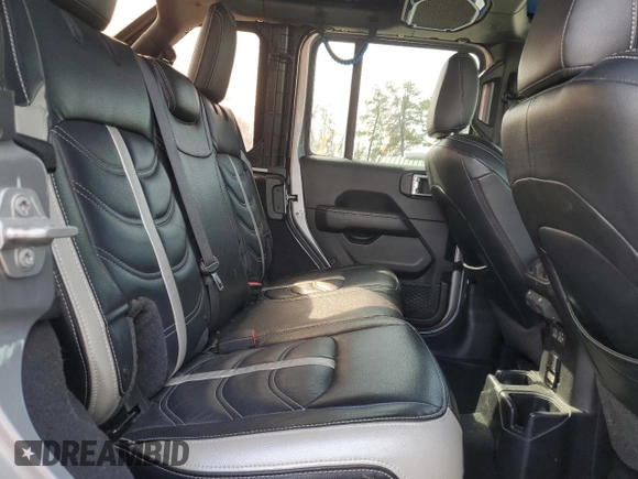 2018 Jeep Wrangler Unlimited Sahara z VIN 1C4HJXEG4JW285606, wystawiony jako Copart lot #49254405 z przebiegiem 57 148 mil mil oraz Szkoda całkowita • Salvage title. Historia ofert i sprzedaży dostępna na DreamBid. Obrazek 10.
