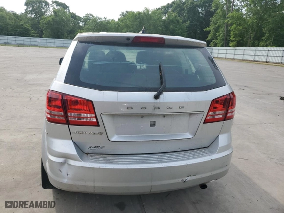 2014 Dodge Journey SE with VIN 3C4PDCABXET117566, listed as a Copart auction lot 53946375 with 140,733 mi miles and Clean Title. Bid and sale history available at carsss.com. Image 6.
