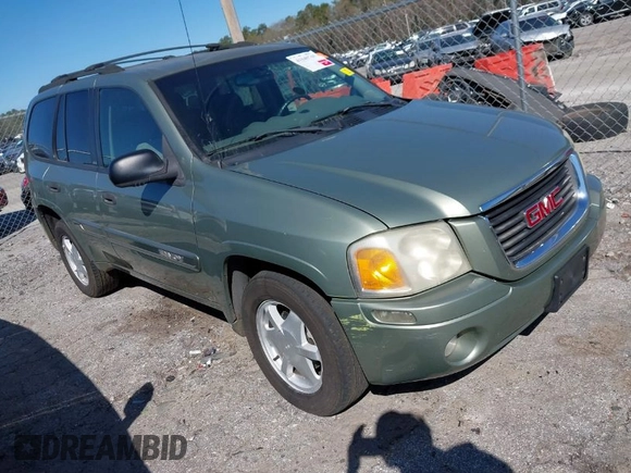 2003 GMC Envoy SLT with VIN 1GKDS13S432373988, listed as a IAAI auction lot 41840744 with 221,306 mi miles. Bid and sale history available at carsss.com. Image 1.