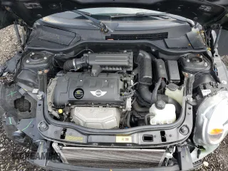 2013 MINI Hardtop with VIN WMWSU3C57DT689655, listed as a Copart auction lot 52161215 with 40,250 mi miles and Salvage Title. Bid and sale history available at DreamBid. Image 11.