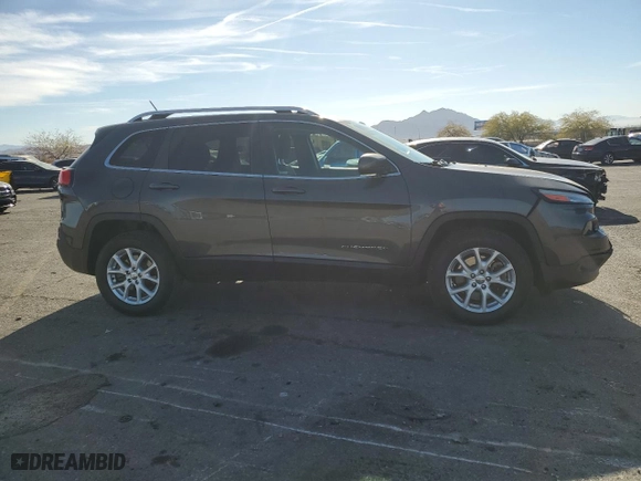 2014 Jeep Cherokee Latitude with VIN 1C4PJMCS7EW272419, listed as a Copart auction lot 87238424 with 164,679 mi miles and Salvage Title. Bid and sale history available at carsss.com. Image 4.