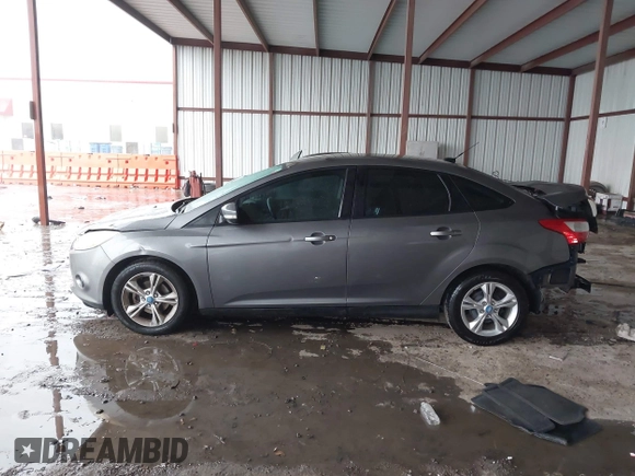2013 Ford Focus SE with VIN 1FADP3F29DL243937, listed as a IAAI auction lot 42145911 with 90,376 mi miles and . Bid and sale history available at DreamBid. Image 14.