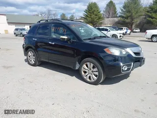2010 Acura RDX Tech Pkg with VIN 5J8TB1H59AA007779, listed as a IAAI auction lot 41894049 with 198,735 mi miles. Bid and sale history available at carsss.com. Image 1.