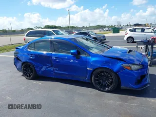 2016 Subaru WRX Premium with VIN JF1VA1E69G9828792, listed as a IAAI auction lot 42523907 with Not provided miles and . Bid and sale history available at DreamBid. Image 6.