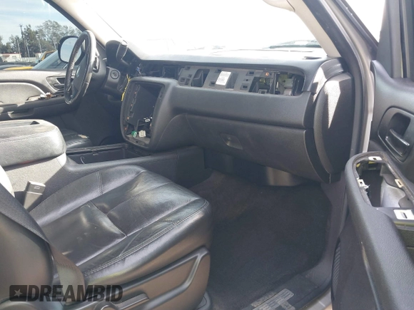 2007 Chevrolet Tahoe LTZ with VIN 1GNFC13077J399911, listed as a IAAI auction lot 41141878 with Not provided miles and . Bid and sale history available at DreamBid. Image 5.