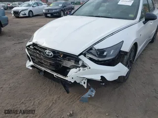 2021 Hyundai Sonata N Line with VIN 5NPEK4JC6MH110611, listed as a IAAI auction lot 41656490 with 52,061 mi miles. Bid and sale history available at carsss.com. Image 6.