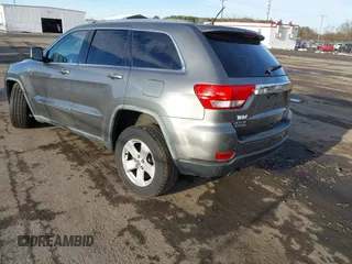 2011 Jeep Grand Cherokee 70th Anniversary with VIN 1J4RR4GT6BC715848, listed as a IAAI auction lot 41562152 with 119,910 mi miles. Bid and sale history available at carsss.com. Image 3.