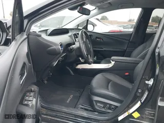 2016 Toyota Prius Four with VIN JTDKARFU5G3018264, listed as a IAAI auction lot 42034508 with 98,071 mi miles. Bid and sale history available at carsss.com. Image 5.