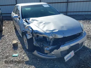 2014 Chevrolet Impala LT with VIN 2G1WB5E31E1184020, listed as a IAAI auction lot 41770355 with 135,367 mi miles and . Bid and sale history available at DreamBid. Image 6.