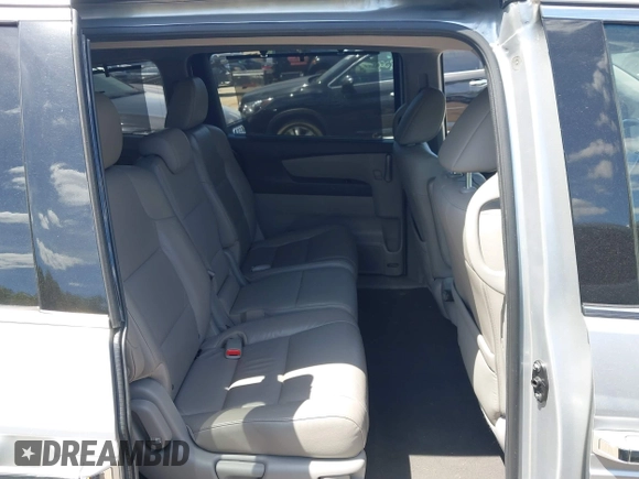 2012 Honda Odyssey Touring with VIN 5FNRL5H9XCB026741, listed as a IAAI auction lot 42808245 with 293,422 mi miles and . Bid and sale history available at DreamBid. Image 8.