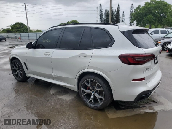 2021 BMW X5 sDrive40i with VIN 5UXCR4C01M9H47230, listed as a Copart auction lot 59798464 with 36,975 mi miles and Salvage title. Bid and sale history available at DreamBid. Image 2.