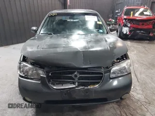 2001 Nissan Maxima SE with VIN JN1CA31A91T112866, listed as a IAAI auction lot 42372546 with 156,069 mi miles and . Bid and sale history available at DreamBid. Image 6.