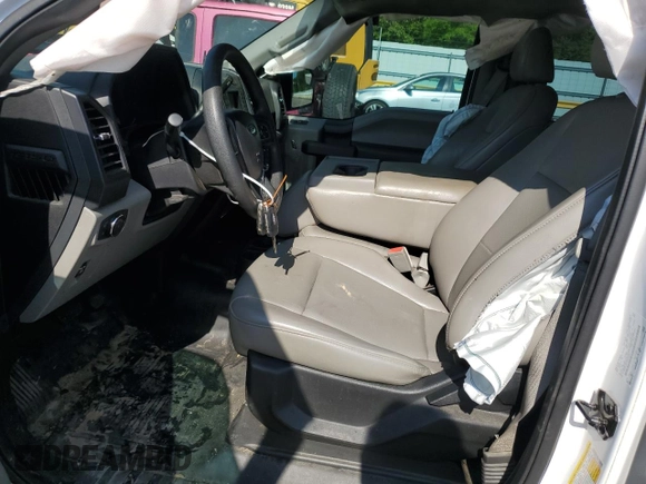 2018 Ford F-150 XL with VIN 1FTEW1CB5JKF02225, listed as a Copart auction lot 52215975 with 120,292 mi miles and Salvage Title. Bid and sale history available at DreamBid. Image 7.