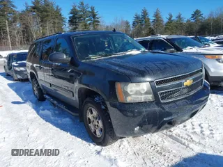 2012 Chevrolet Suburban LT with VIN 1GNSKJE71CR296524, listed as a IAAI auction lot 41394741 with 173,623 mi miles. Bid and sale history available at carsss.com. Image 1.