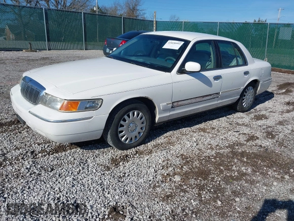 1999 Mercury Grand Marquis GS z VIN 2MEFM74W0XX686623, wystawiony jako IAAI lot #41828993 z przebiegiem 245 171 mil mil oraz . Historia ofert i sprzedaży dostępna na DreamBid. Obrazek 2.