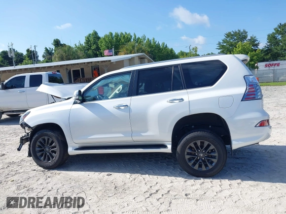 2021 Lexus GX 460 Premium with VIN JTJAM7BX0M5302132, listed as a IAAI auction lot 42462529 with 57,564 mi miles and . Bid and sale history available at DreamBid. Image 14.