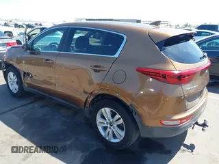 2017 Kia Sportage LX z VIN KNDPMCAC5H7121297, wystawiony jako IAAI lot #42088915 z przebiegiem 91 374 mil mil oraz . Historia ofert i sprzedaży dostępna na DreamBid. Obrazek 3.