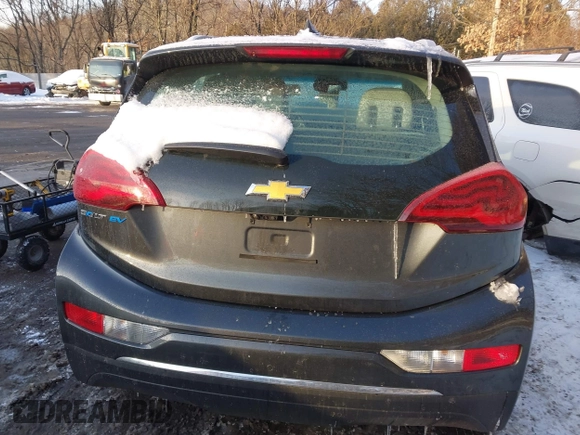 2021 Chevrolet Bolt EV Premier z VIN 1G1FZ6S09M4113694, wystawiony jako IAAI lot #41378289 z przebiegiem 40 979 mil mil oraz . Historia ofert i sprzedaży dostępna na DreamBid. Obrazek 17.