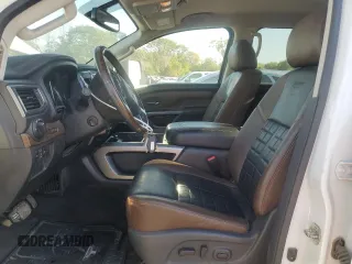 2017 Nissan Titan XD PRO-4X with VIN 1N6BA1F44HN541022, listed as a Copart auction lot 73966134 with 66,582 mi miles and Salvage Title. Bid and sale history available at carsss.com. Image 7.