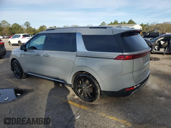 2023 Kia Carnival SX with VIN KNDNE5H36P6211360, listed as a Copart auction lot 88350205 with 52,145 mi miles and Salvage Title. Bid and sale history available at carsss.com. Image 2.
