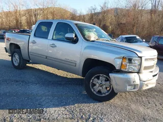 2011 Chevrolet Silverado 1500 LT with VIN 3GCPKSE32BG256047, listed as a IAAI auction lot 40758557 with 156,507 mi miles. Bid and sale history available at carsss.com. Image 1.