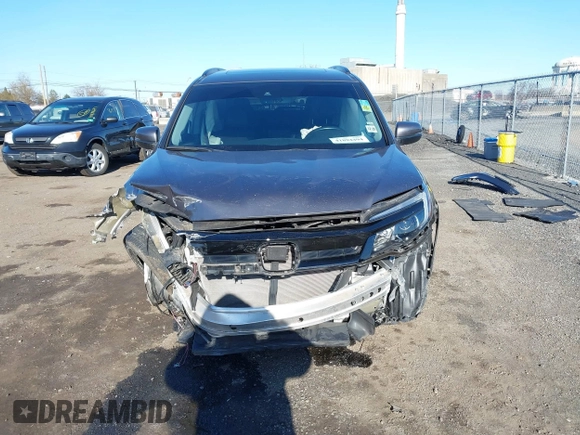 2021 Honda Pilot Special Edition with VIN 5FNYF6H25MB041029, listed as a IAAI auction lot 41894494 with 35,576 mi miles and . Bid and sale history available at DreamBid. Image 13.