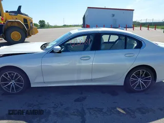 2021 BMW 3 Series 330i xDrive with VIN WBA5R7C0XMFK54525, listed as a IAAI auction lot 42320181 with 54,576 mi miles and . Bid and sale history available at DreamBid. Image 14.