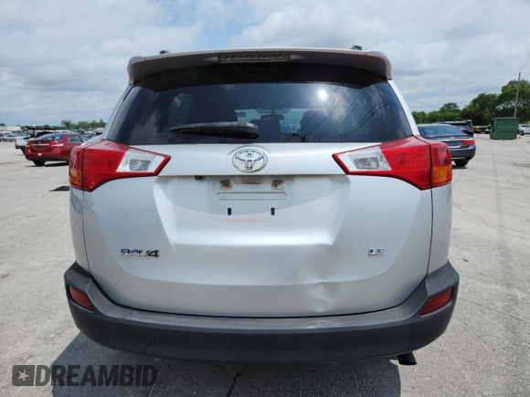 2014 Toyota RAV4 LE with VIN 2T3ZFREV3EW107626, listed as a Copart auction lot 61142985 with 141,094 mi miles and Salvage title. Bid and sale history available at DreamBid. Image 6.