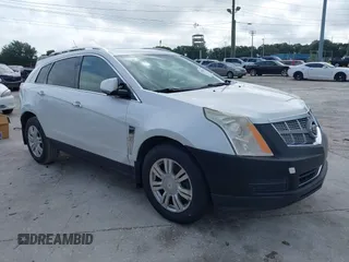 2011 Cadillac SRX Luxury Collection with VIN 3GYFNAEY7BS584662, listed as a IAAI auction lot 40268537 with 157,817 mi miles. Bid and sale history available at carsss.com. Image 1.